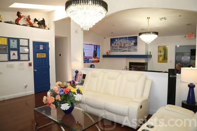 We Care Residential Home, assisted living in Las Vegas, NV — Brightly lit living room with modern furniture and decor