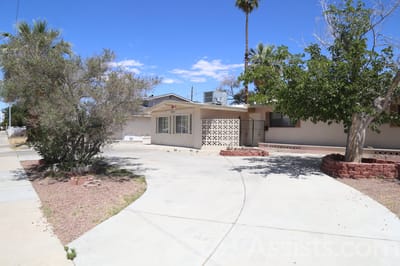 Exterior view of Angels Care facility with landscaping