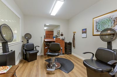 Interior of a hair salon with styling chairs
