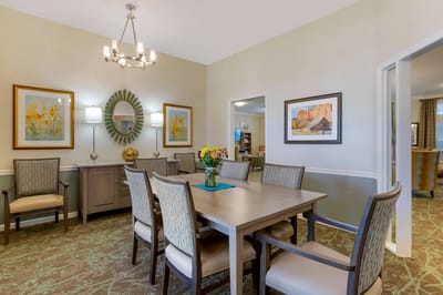 Bright and inviting common area with dining table