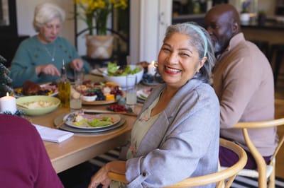 Residents enjoying a meal together in a dining area