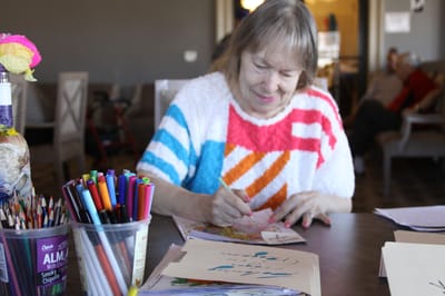 Resident engaged in an arts and crafts activity