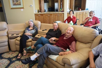 Residents enjoying a gathering in a common area