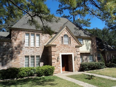 Exterior view of a residential facility with landscaped front