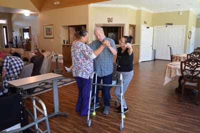 Residents engaging in a supportive group activity indoors
