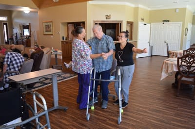 Residents interacting in a cozy common area