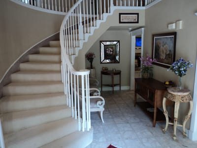 Spacious interior staircase in a senior living facility