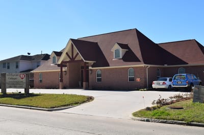 Exterior view of Loving Care Cottage, showing building and entrance