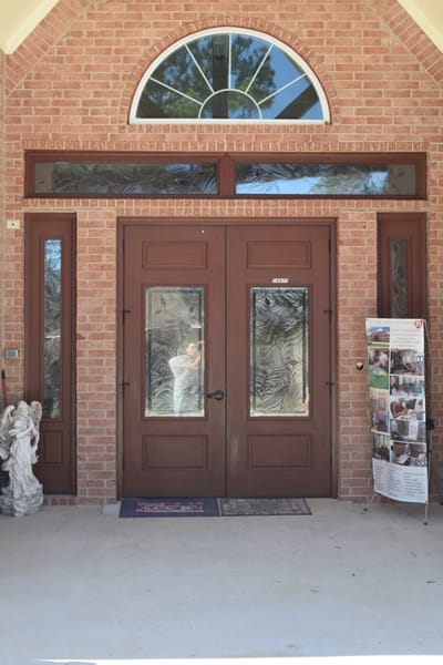 Front entrance of Loving Care Cottage with decorative door