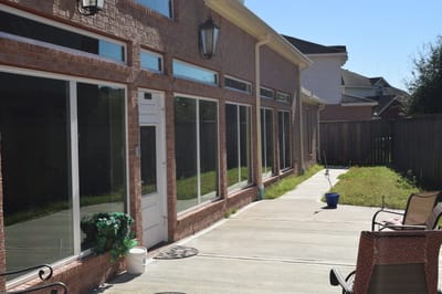 Outdoor patio area next to a senior living facility