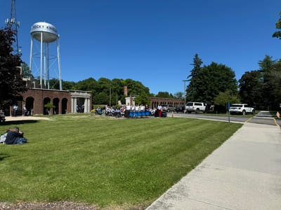 Residents and staff gathered outdoors for an event