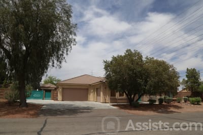 Exterior view of Amethyst Care Home with landscaping