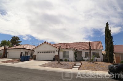 Exterior view of a residential facility with garden