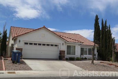 Exterior view of a residential building with a driveway
