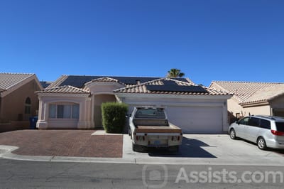 Exterior view of a residential building with a driveway