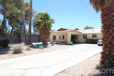 Exterior view of Dignified Care Manor facility
