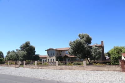 Exterior view of Livingston Home with gardens