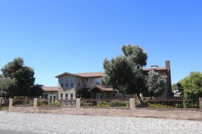 Exterior view of Livingston Home with landscaping