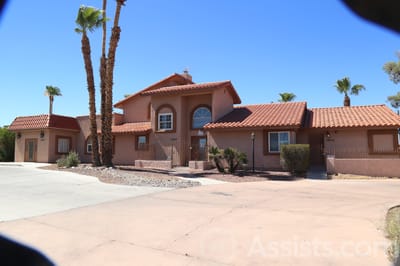 Exterior view of Livingston Home II with landscaping