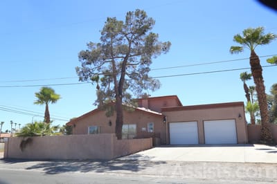 Exterior view of Livingston Home II with landscaping