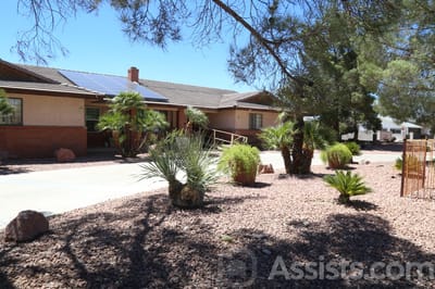 Exterior view of Rosario's Group Home with landscaping