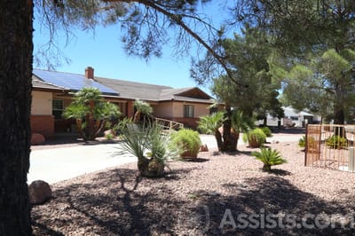 Exterior view of Rosario's Group Home with landscaping