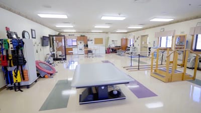 Rehabilitation therapy room with equipment and facilities