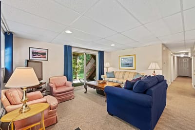 Cozy living room with seating and natural light