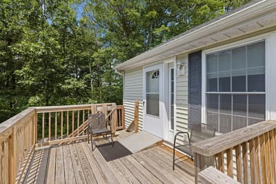 Deck area of a senior living facility with chairs
