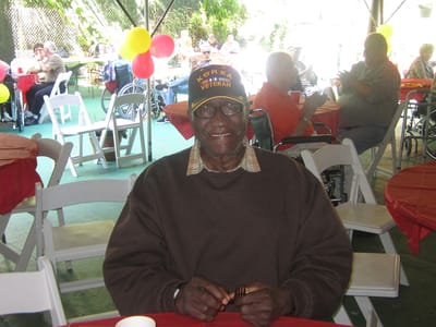 A resident enjoying a celebration outdoors