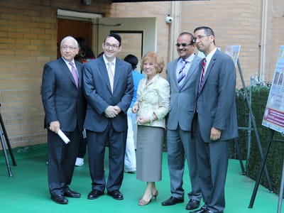 Group of five people outside the facility at an event