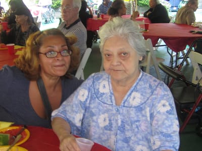 Residents enjoying a meal at an event
