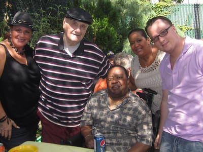 Residents and staff enjoying an outdoor gathering
