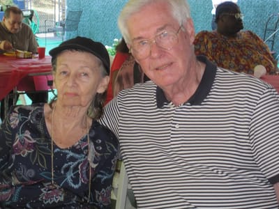 Seniors enjoying time together outdoors in a social setting