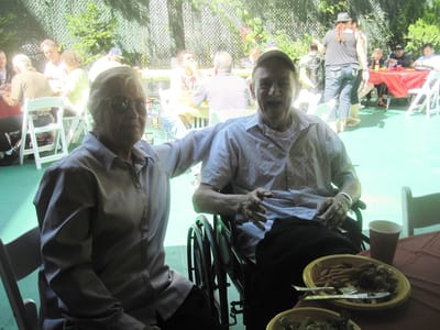 Residents enjoying a meal at a festive gathering