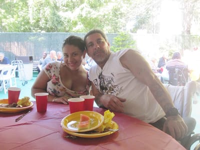 Residents enjoying a meal outside during an event