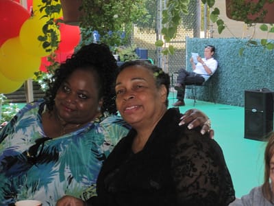 Two residents posing together at an event