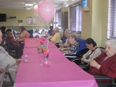 Residents enjoying a social event with decorations