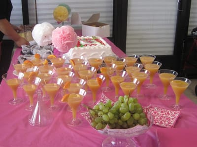 Colorful drinks and food setup for a celebration