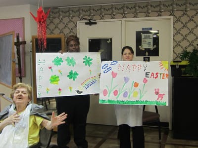 Residents and staff celebrating Easter with decorations
