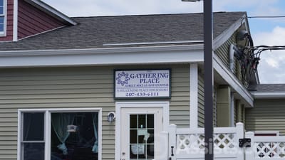 The Gathering Place Adult Social Day Center logo on building