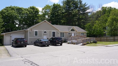 Exterior view of Lenox Street Home with parking area