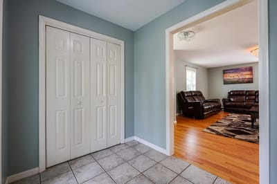 A view of an interior hallway with seating
