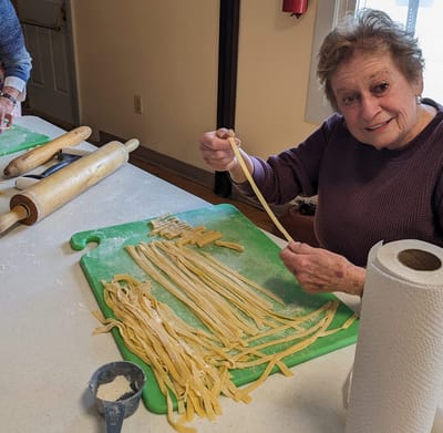 Resident preparing homemade pasta in the kitchen