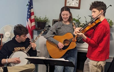 Musical performance by young musicians indoors.