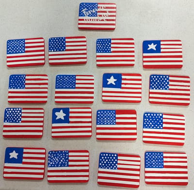 Painted wooden flags in a creative display