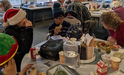 Residents enjoying food and conversation together