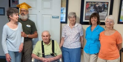 Residents and staff celebrating a milestone event.
