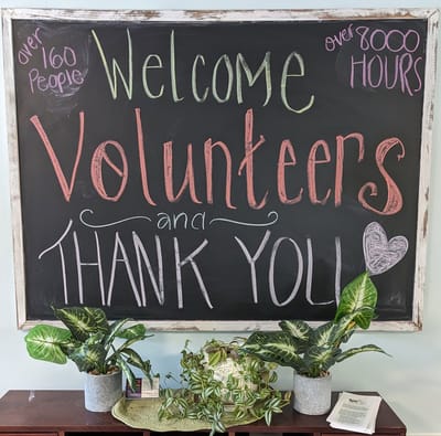 Chalkboard welcoming volunteers with a gratitude message
