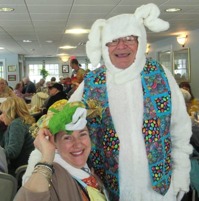 Residents participating in a festive event with costumes.